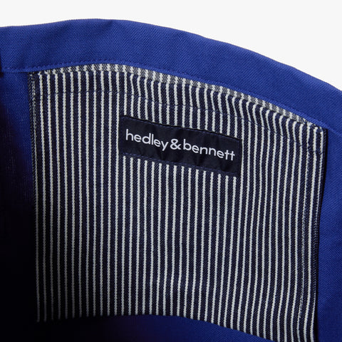 Designer Logo Solid Open Top Tote with Exterior Pockets