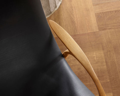 Timeless Minimalist Wingback Lounge Chair with Saber Legs