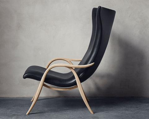 Timeless Minimalist Wingback Lounge Chair with Saber Legs