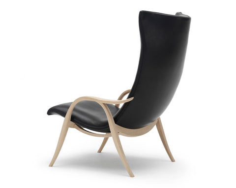 Timeless Minimalist Wingback Lounge Chair with Saber Legs