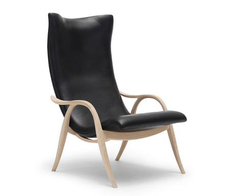 Timeless Minimalist Wingback Lounge Chair with Saber Legs