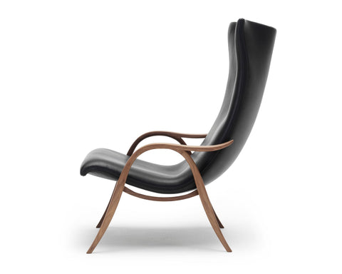 Timeless Minimalist Wingback Lounge Chair with Saber Legs